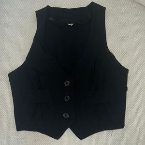 Trendy black vest.